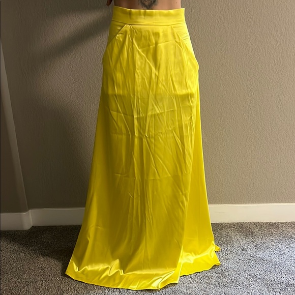 Extra long metallic yellow skirt